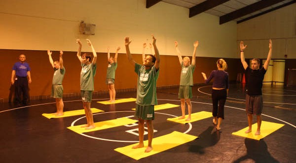 Yogis using the Rousettus Visually Impaired Yoga Mat